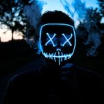 Pro Series LED gezichtsmasker voor huidverzorging met verschillende lichtinstellingen voor anti-aging en acne behandeling.